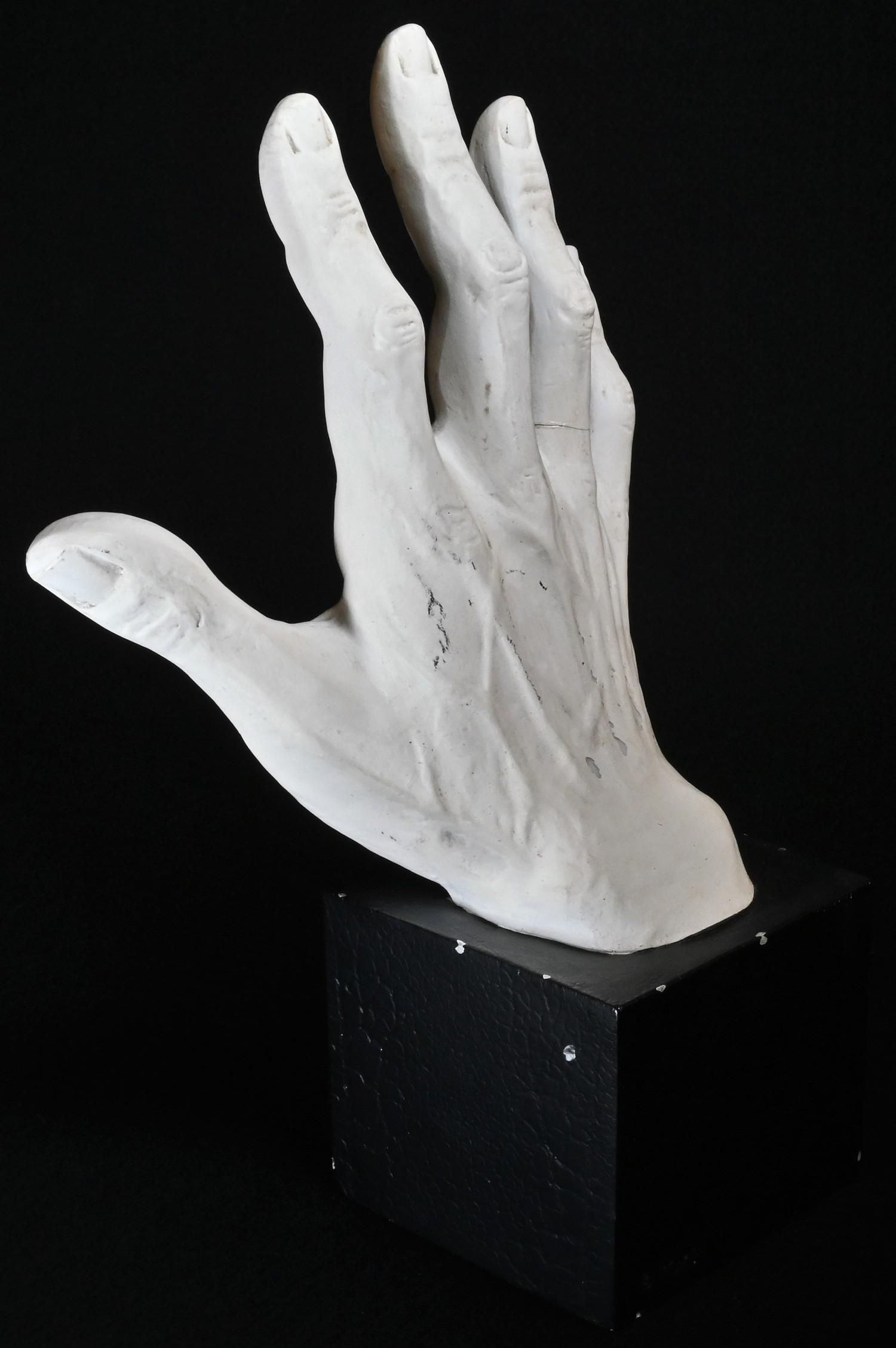A plaster anatomical study, of a man's hand, square plinth, 27cm high
