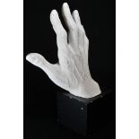 A plaster anatomical study, of a man's hand, square plinth, 27cm high