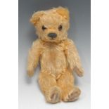 A 1940's Chad Valley golden mohair jointed teddy bear, formerly known by his previous owner as