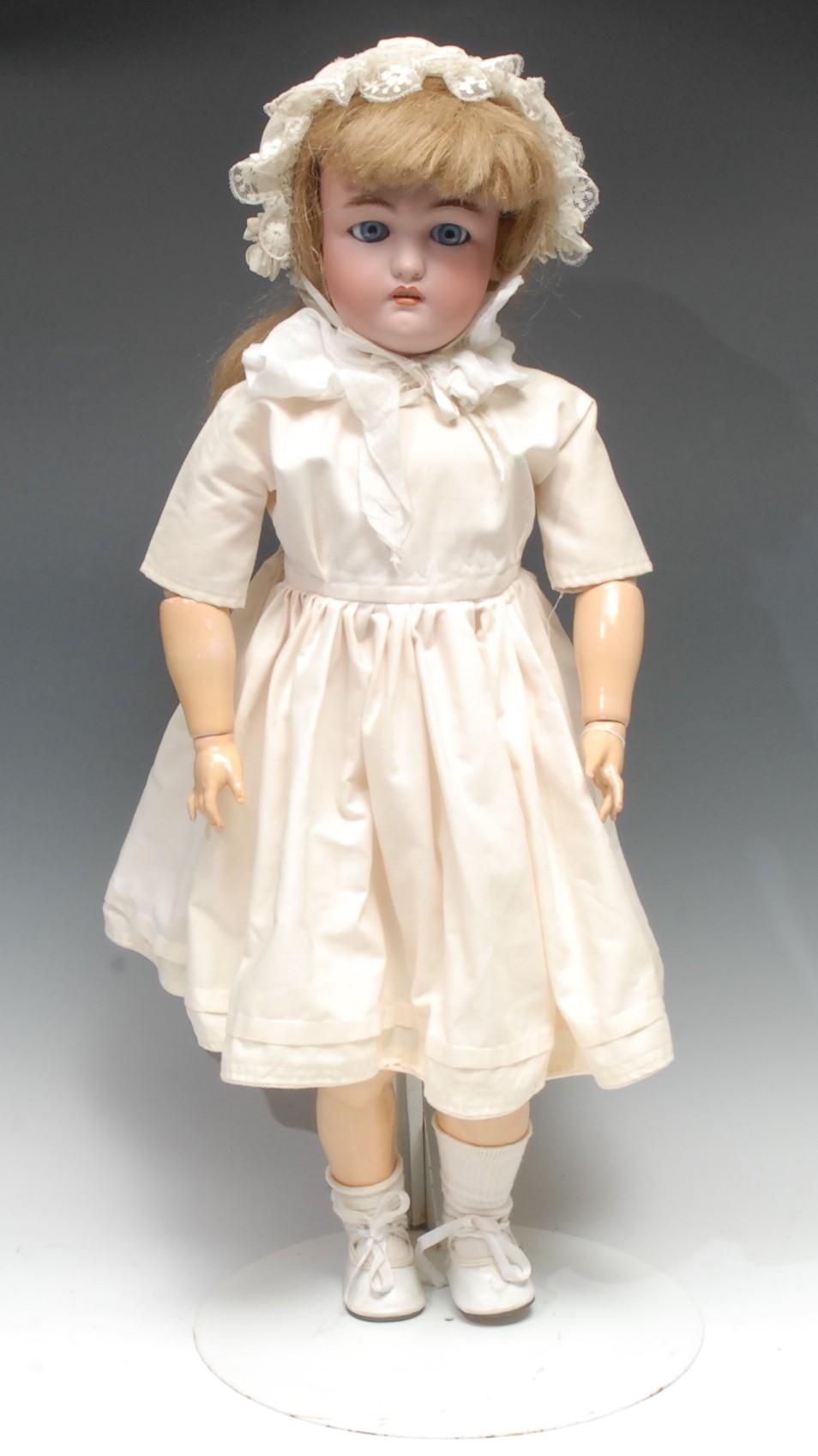 A Simon & Halbig (Germany) bisque head and ball jointed painted composition bodied doll, Jutta mold,