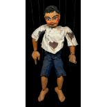 Puppetry - a mid-20th century marionette puppet, in the form of an Asian boy, carved and painted