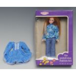 Palitoy Pippa's friend Tammie pocket size fashion doll, red hair, wearing a blue blouse with printed