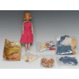 Palitoy Tressy's little sister Toots doll, blonde hair, painted side glancing blue eyes, wearing a