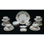 A Royal Crown Derby Posies pattern part tea set, comprising six cups, saucers and side plates,