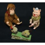 Toys and Juvenalia - a hand operated pecking chick with squeaker; a plush glass monkey with glass