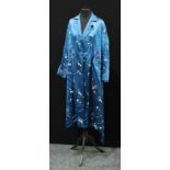 Textiles - a Chinese blue silk dressing gown, embroidered with cherry blossom, roses and