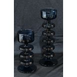 A Sheringham pattern five disc blue glass candlestick, 22.5cm high, designed by Ronald Stennett-