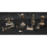 A collection of silver toys, mostly 19th/early 20th century Dutch, including a ferris wheel; a