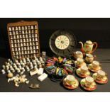 A quantity of sewing thimbles, various, some on a wooden stand; a 1960's Hotwheels Mattel rally case