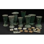 Retail Salvage - a composed set of eight shop/florist bouquet display vases; a collection of price