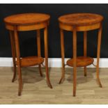 A pair of contemporary Louis XVI style occasional tables, each with an oval top above a conforming