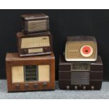 A Philco brown Bakelite valve radio, 45cm wide, 32cm high; a Bush walnut veneer radio receiver, type