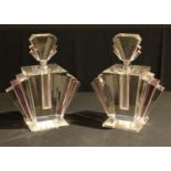 A large pair of Art Deco style pink and clear glass fan shaped scent bottles, 24cm high