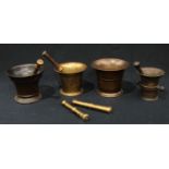 A bronze mortar and pestle; others similar (4)