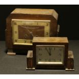 An Art Deco oak cased mantel clock; another (2)