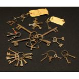 A collection of vintage keys including Amalgamated Key and Accident, Derby reward keyring