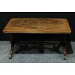 A Regency style mahogany lyre end coffee table