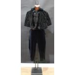 Textiles - fashion and costume, a black velvet beadwork cape and a pair of velvet breeches (2)