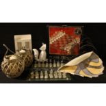 A glass chess set on board, boxed; a glass shell; a pair of candle lanterns; a stylised model of a