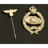Militaria - a Third Reich Nazi German Eagle stick pin; a Kings Crown Royal Tank Regiment cap