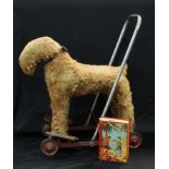 Toys - a push along dog; a Chad valley money box (2)