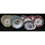 A set of four 19th century Coalport type shaped circular dessert plates, pierced borders, painted