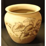 A late 19th century Langley Ware jardiniere, incised decoration of leaves in tones of brown on a