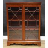 A George III style mahogany astragal glazed bookcase