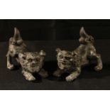 A pair Chinese bronzed metal temple dogs, each approx. 15cm long