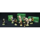 A collection of Beswick pigs, comprising PP7 James triangle, boxed; PP1 John conductor, boxed; PP8