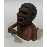 A cast Iron Jolly money bank, cast wearing a shirt and bow tie, leaver action arm, two section body,