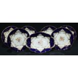 A Coalport dessert service, comprising shaped oval serving dish and six shaped circular dessert