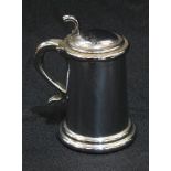 A Dunhill novelty lighter, as a lidded tankard