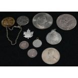 Coins - a George III silver crown 1819; a William III silver shilling 1696; a silver Coronation