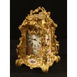 A Rococo style carriage clock, 24cm over handle