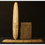 Treen - an Ethnographic carved mask, 99.5cm high; a wall mounted rack carved with mythical