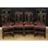 A set of eight late 19th/early 20th century oak dining chairs, comprising a pair of carvers and