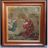 A large 19th century Berlin woolwork religious picture, 67cm x 62cm, c.1850, maple frame