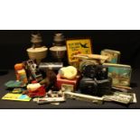 A papier mache domed jewellery box, late 19th century; a Bell and Howell cine camera; postcards,