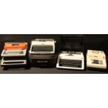 An Olympia Monica typewriter, cased; others, Olympia Monica S and Petite International De Luxe; an