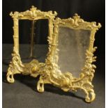 A pair of brass Rococo style easel picture frames, 23.5cm high
