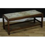 An early 20th century oak long stool or window seat, 44cm high, 99cm wide, 40.5cm deep, c.1930