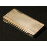 An Art Deco silver vanity case, hinged cover enclosing a make-up mirror, two powder compact