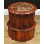 A Victorian mahogany circular pedestal boudoir commode, hinged seat with inset needlework panel,