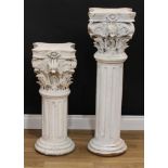 A pair of painted hardwood statuary pedestals, each as a Cornithian column with an incurve square