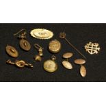 A 9ct gold oval brooch; a 9ct knot brooch; gold plated cufflinks; gold plated locket; etc
