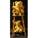 A blonde mohair teddy bear; another similar; a pine doll's highchair (3)