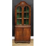 A George I style mahogany crossbanded walnut veneer floor standing corner display cabinet, of