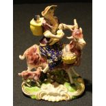 A Derby figural group, The Welch Tailor's Wife, typically modelled, painted in polychrome and picked