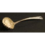 A George III silver chased 'berry' sifter spoon, LOndon 1808